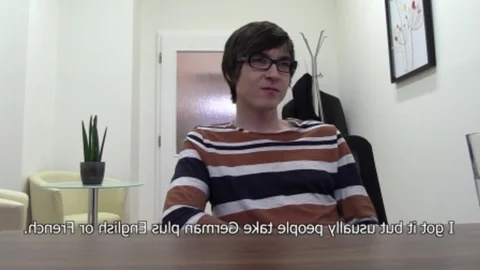 non-professional boy with sleazy hairstyle and glasses