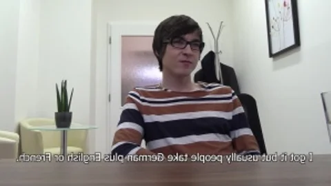 non-professional boy with sleazy hairstyle and glasses